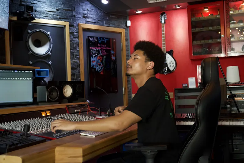 Kai McGilvery mixing at the Sonic Studio console