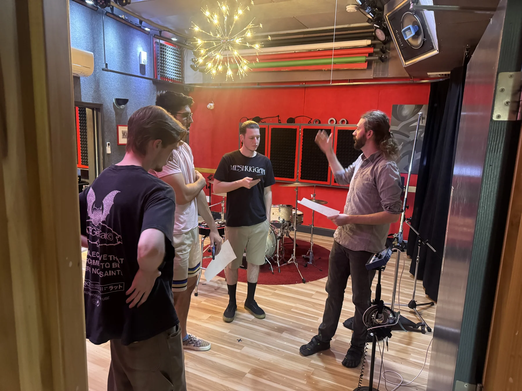 A Sonic-Rocket training session in the live room: an engineer walks a group through the session plan.