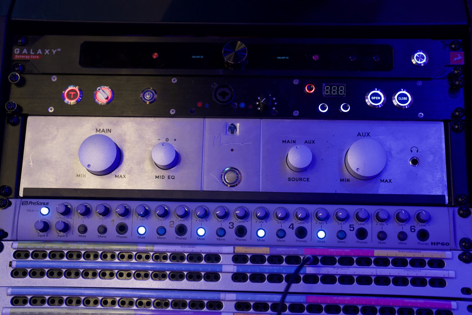 Shuttle Bay equipment rack in blue light: Antelope Galaxy interface, monitor controller and patch bays